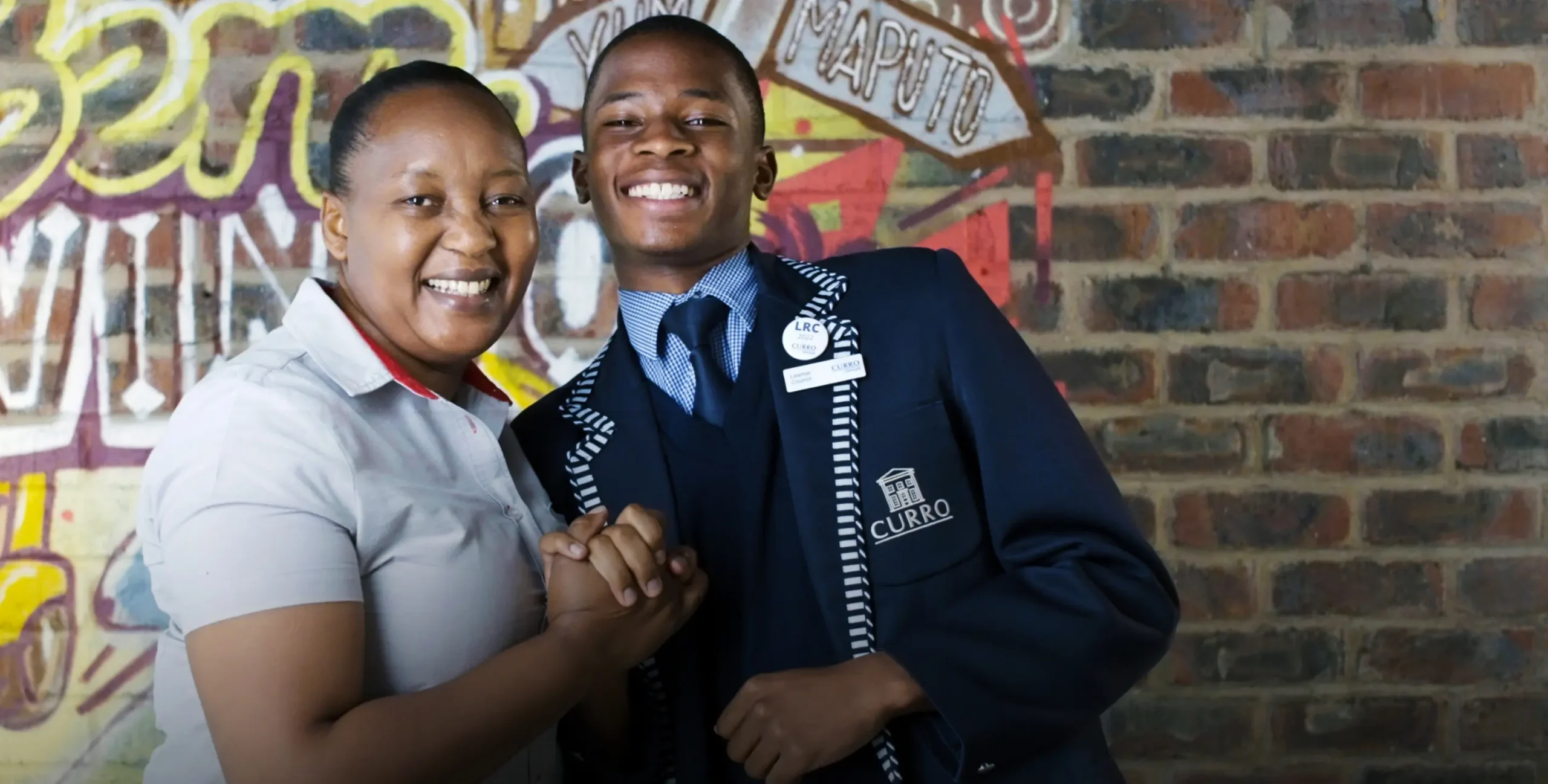 KFC team member and Curro Grade 8 to 12 scholar smiling together